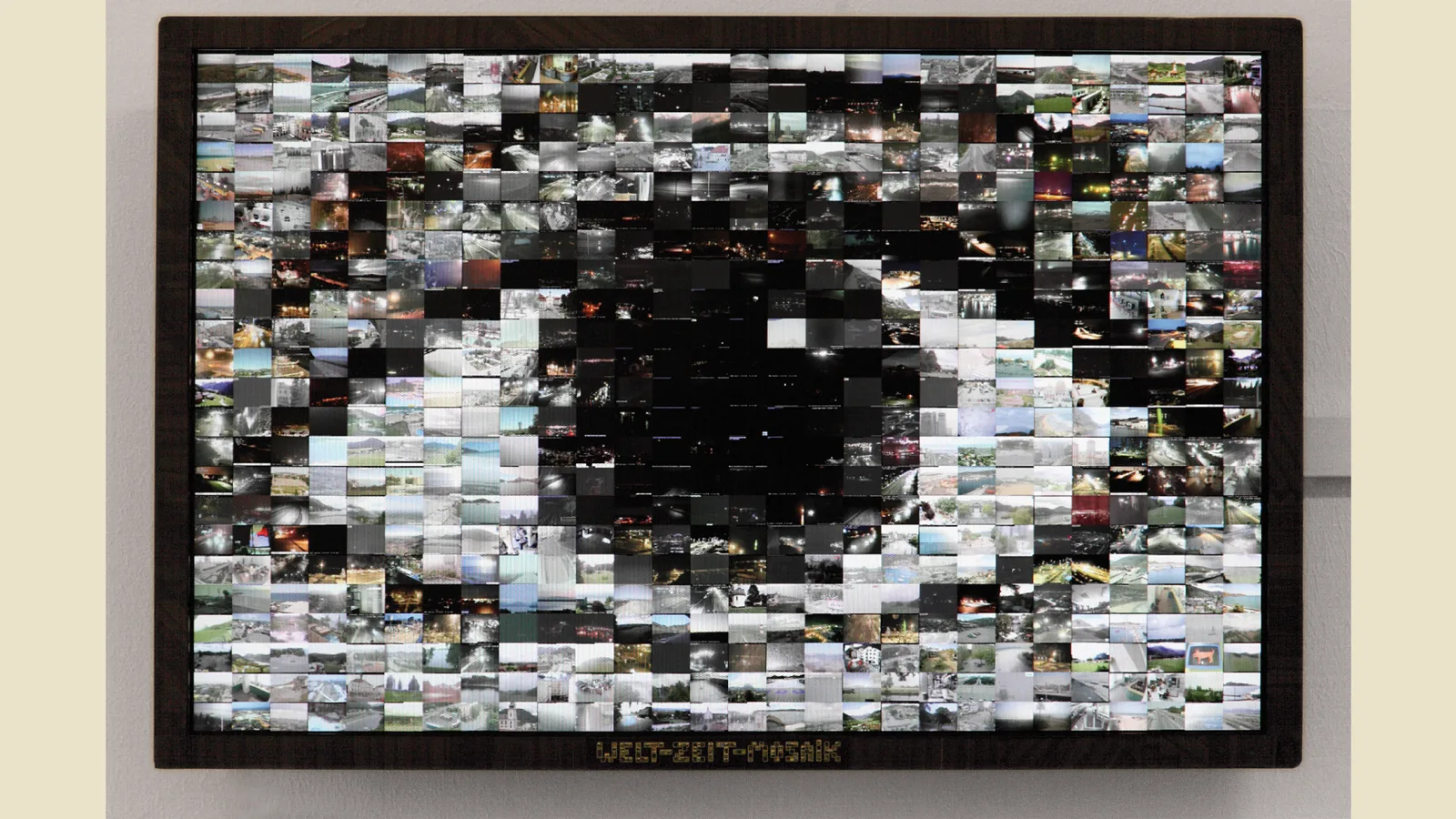 “Digital Traces”, Julia Staudach: “Welt-Zeit-Mosaik”, installation with digital images, 2009. Photo: Sue Sellinger